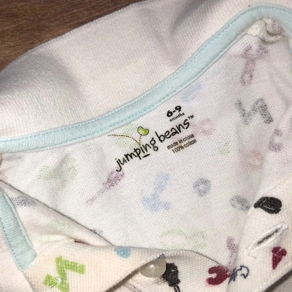 Jumping Beans size 6-9 months handyman onesie